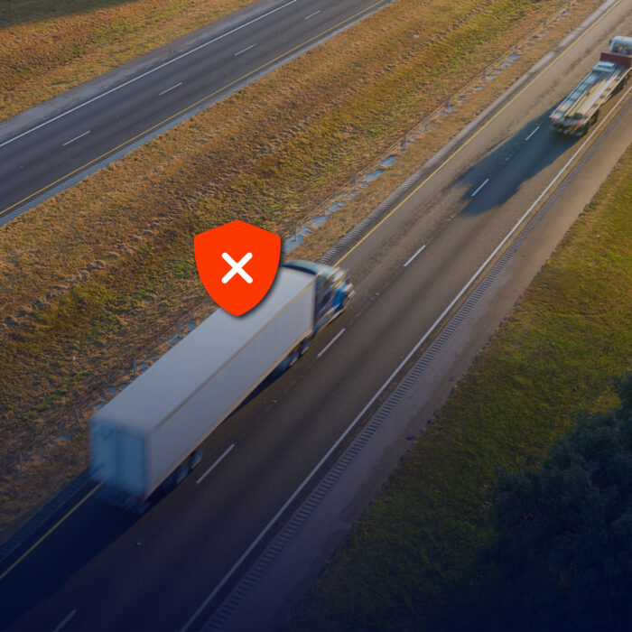 Truck with an x, showing that not all insurance covers theft by deception.